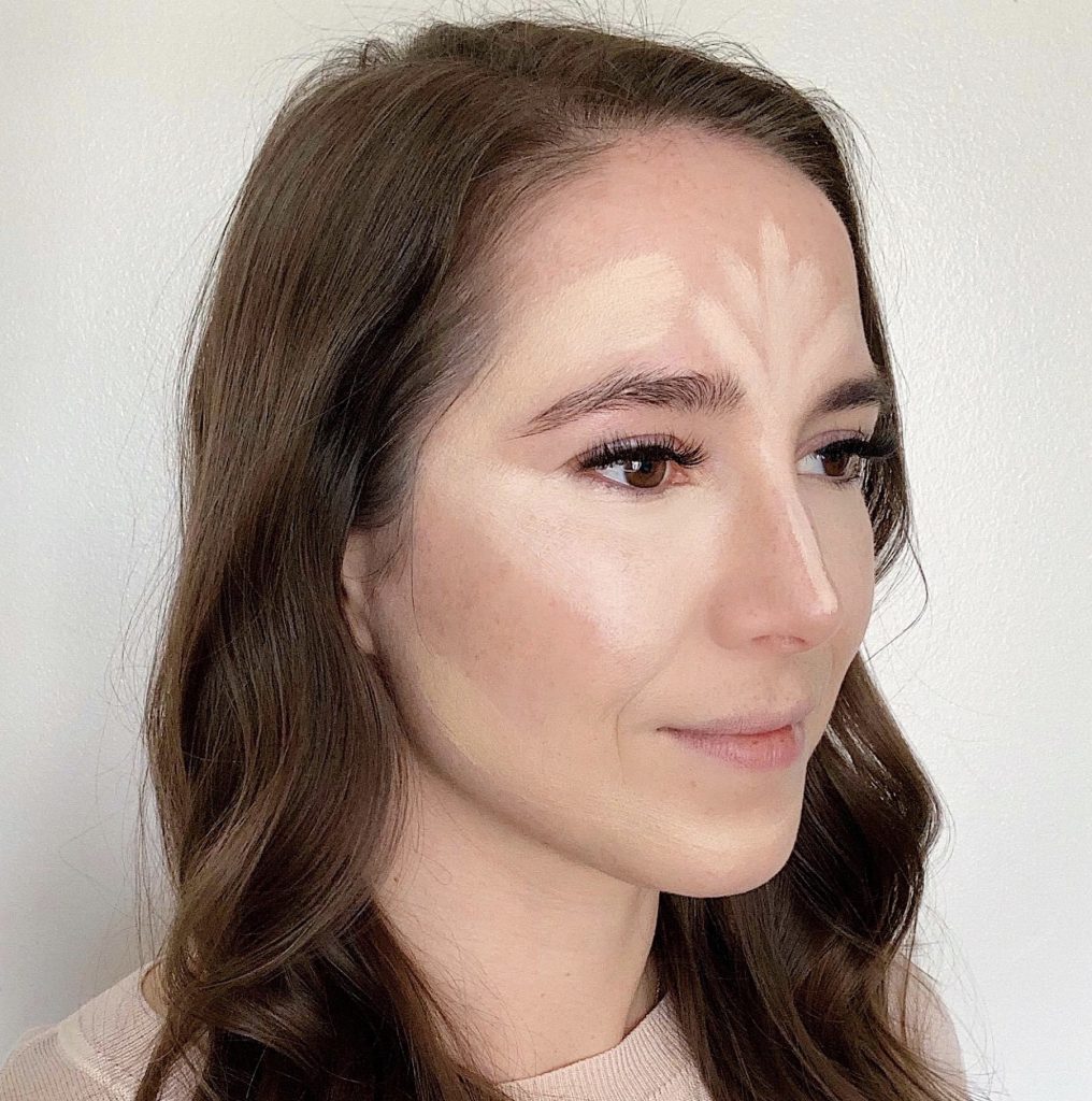 How to Contour in 5 Easy Steps by popular beauty blogger and top artist with Maskcara Beauty, Kelly Snider; Image of second step applying the accent highlight color.