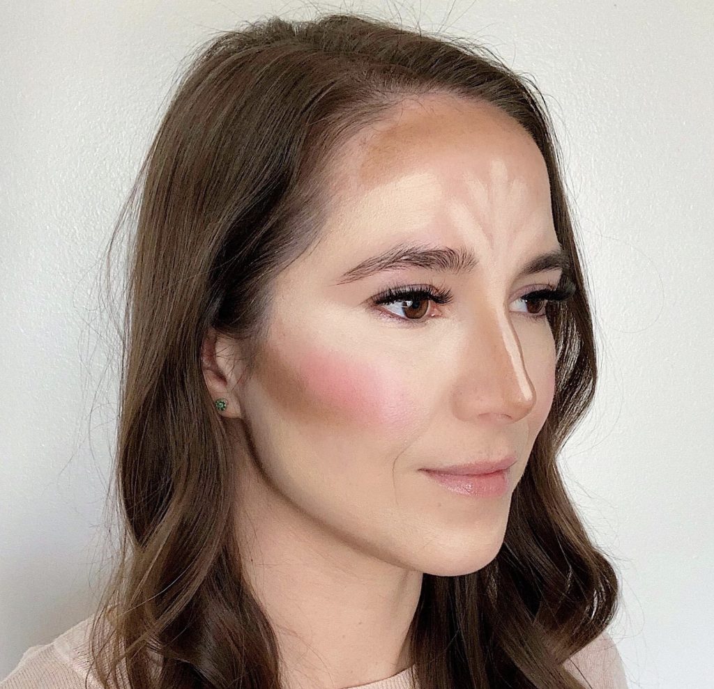 How to Contour in 5 Easy Steps by popular beauty blogger and top artist with Maskcara Beauty, Kelly Snider; Image of fourth step applying the lip+cheek color.