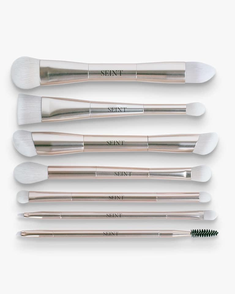 Picture of eyeshadow and regular Seint Brushes that are great for using your custom eyeshadow palettes