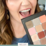 Picture of Kelly Snider displaying her Seint Eyeshadow Palette